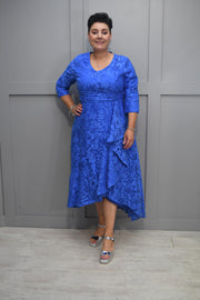 Cassandra Royal Blue Floral Dress With Side Ruffle & Brooch Detail- Cal 929